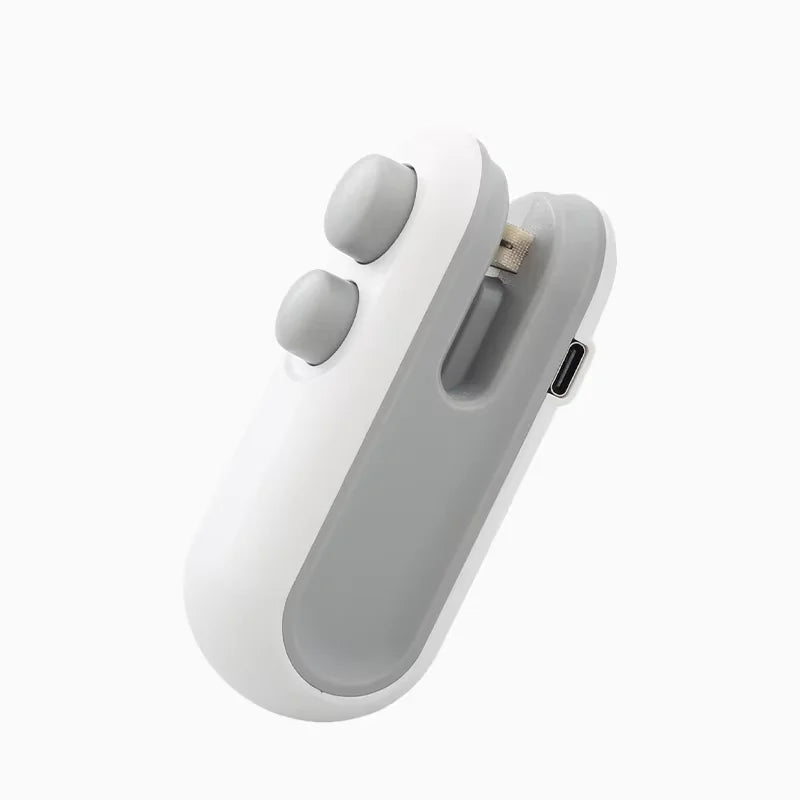 Hnventis 2-in-1 rechargeable mini bag sealer with cutter, portable thermal plastic bag sealer for food storage and sealing.